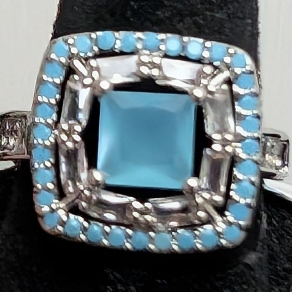 The five-stack of ring of the Princess of Wales became a  #115.Light Blue Square Halo Ring -Sizev7